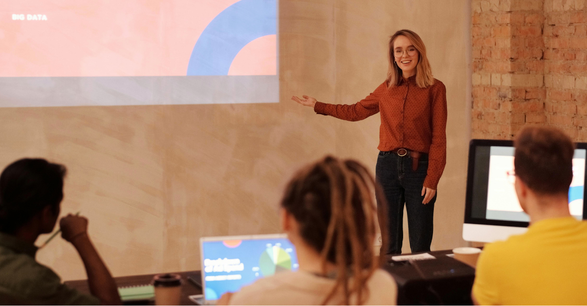A woman presenting a workshop.